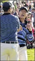  ?? GETTY IMAGES ?? Sang-moon Bae (left) and Danny Lee celebrate as they give the Internatio­nal team a win.