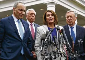  ?? EVAN VUCCI / ASSOCIATED PRESS ?? House Speaker Nancy Pelosi comments after a White House meeting on border security. With her are (from left) Senate Minority Leader Chuck Schumer, House Majority Leader Steny Hoyer and Sen. Dick Durbin.