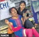  ?? PTI ?? A student tends to her injured classmate at the Women’s College Science Block in Ranchi.