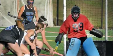  ?? GENE WALSH — DIGITAL FIRST MEDIA ?? Central Bucks South goalie Jillian Heilig tracks the ball near the net during the Titans’ District 1-3A second round game against Plymouth Whitemarsh Wednesday.