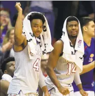  ?? Orlin Wagner / Associated Press ?? Kansas guards Devonte Graham, left, and Malik Newman provide the Jayhawks with a potent one-two punch in the backcourt.