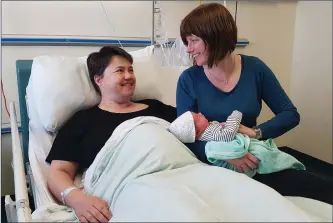  ??  ?? Ruth Davidson and Jen Wilson with baby Finn Paul at Edinburgh Royal Infirmary.