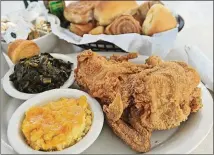  ?? STEIN FOR THE AJC BECKY ?? Atlanta classic Mary Mac’s Tea Room dishes up Southern classics like fried chicken, collard greens and macaroni and cheese.