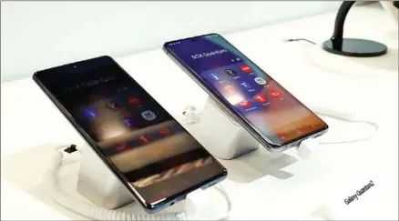  ?? THE KOREA HERALD ?? Samsung Galaxy Quantum 2 phones are displayed at SK Telecom’s Mobile World Congress 2022 exhibition, in Barcelona, Spain.