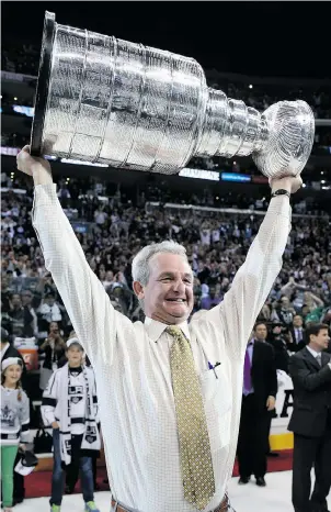  ?? BRUCE BENNETT/ GETTY IMAGES ?? Los Angeles coach Darryl Sutter, not one to show much emotion behind the bench, let loose Friday after his Kings won the Stanley Cup with a thrilling 3- 2 double OT win over the Rangers.