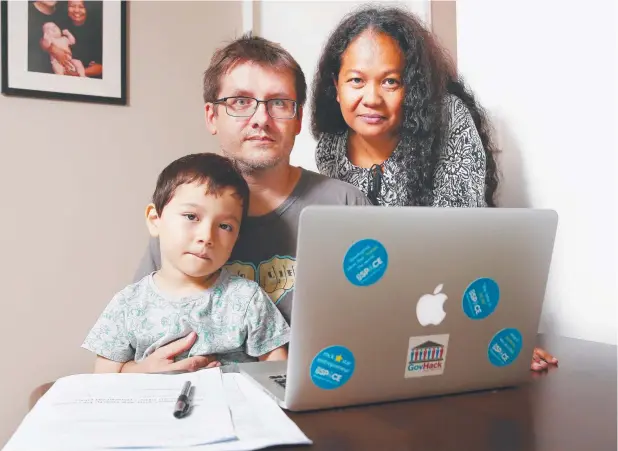  ?? Picture: BRENDAN RADKE ?? WORK AFFECTED: (From left), Albert Jindra Junior, Albert Jindra and Rosie Jindra have been trying to get the NBN up and running at their Manoora property for six weeks, and are still awaiting action from either their internet service provider or the...