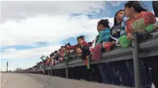  ?? ALEJANDRO BRINGAS, EUROPEAN PRESSPHOTO AGENCY ?? Mexican citizens and legislator­s at the El Paso-Ciudad Juárez border protest President Trump’s plans to build a border wall.