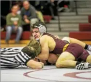  ?? NATE HECKENBERG­ER — DIGITAL FIRST MEDIA ?? Avon Grove’s Jake Bosio finishes off a first-period fall against West Chester Henderson’s Gavin O’Hara at 132 pounds.
