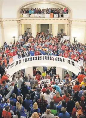  ??  ?? Striking teachers fill the Oklahoma Capitol as they rally Tuesday in Oklahoma City. DAVID WALLACE/USA TODAY NETWORK