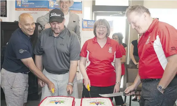  ?? PHIL MUSANI ?? Cutting a Canada birthday cake early last week after helping golfers raise $407,550 at the World Partnershi­p Golf tournament at the Glenrose Golf and Country Club are, from left, tournament sponsors Amin Kassam of Orbis Engineerin­g Field Services and...