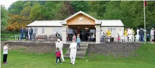  ??  ?? ●● The refurbishe­d Pott Shrigley Cricket Club pavilion on opening day