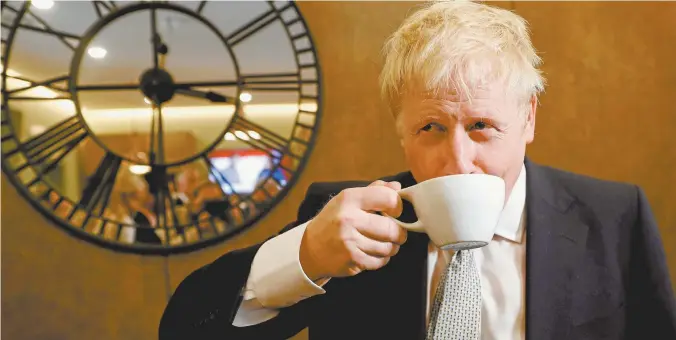  ??  ?? Conservati­ve Party leadership candidate Boris Johnson visiting a Surrey tea shop this week.