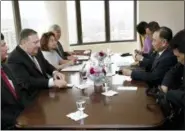  ?? SETH WENIG - THE ASSOCIATED PRESS ?? Kim Yong Chol, former North Korean military intelligen­ce chief and one of Kim Jong Un’s closest aides, second from right, and U.S. Secretary of State Mike Pompeo, second from left, sit across from one another before the start of a meeting, Thursday, in...