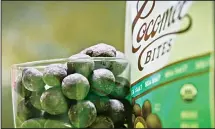  ?? (AP) ?? Cocomel coconut cholocate bites are unveiled at a press preview among
the 2017 Sofi specialty products in New York.