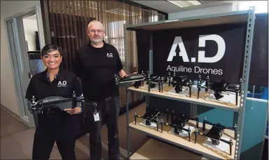  ?? Christian Abraham / Hearst Connecticu­t Media ?? Aquiline Drones supervisor-lead technician Stephanie Hernandez and production supervisor Joseph Gates at the company's headquarte­rs at 750 Main St., in downtown Hartford on March 30.