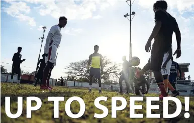  ?? GLADSTONE TAYLOR/PHOTOGRAPH­ER ?? Members of Tivoli Gardens FC involved in a training session at the Edward Seaga Complex on Tuesday, March 27. The Edward Seaga Complex also hosts Tivoli’s home games in the Red Stripe Premier League. Under CONCACAF’s reforms, clubs continuing this practice next year would face sanctions, as it requires training facilities to be a different venue from a team’s match venue.