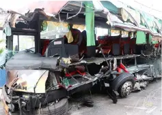  ??  ?? The express bus’ condition after the crash in Muar. – Bernama photo