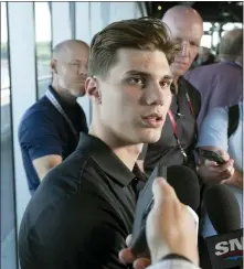  ?? RYAN REMIORZ — THE CANADIAN PRESS VIA AP ?? Juraj Slafkovsky, of Slovakia, speaks to reporters at the NHL Draft top hockey prospects media availabili­ty on Wednesday in Montreal.