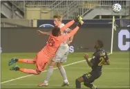  ?? PETE BANNAN – MEDIANEWS GROUP ?? Union goalkeeper Andre Blake here making a nifty save against the Red Bulls in April, was sharp again Sunday in a shutout of Inter Miami.