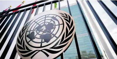  ?? AP ?? The symbol of the United Nations is displayed on the main gate outside UN headquarte­rs in New York.