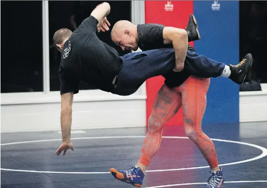  ?? ALLEN McINNIS ?? For 16 years, UFC superstar Georges St-Pierre has been training at the Montreal Wrestling Club, where wrestlers know him as “a very humble person.”