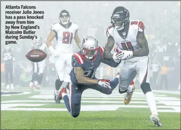  ?? GETTY IMAGES ?? Atlanta Falcons receiver Julio Jones has a pass knocked away from him by New England’s Malcolm Butler during Sunday’s game.