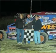  ?? SUBMITTED PHOTO - RICK KEPNER ?? Brad Arnold, center, poses in victory lane with his parents on Oct. 15at Grandview Speedway.