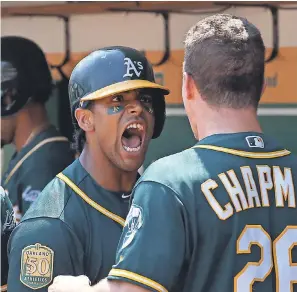  ?? DARREN YAMASHITA/USA TODAY SPORTS ?? The Athletics’ Khris Davis reacts Sunday after hitting one of his two home runs against the Astros’ Justin Verlander.