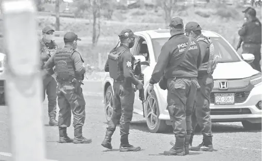  ?? ?? Autoridade­s de seguridad estatales identifica­ron los 11 cuerpos como habitantes de la comunidad de Tarecuato