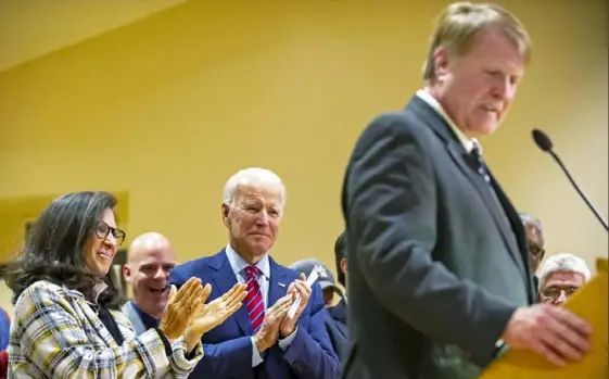  ?? Christian Snyder/Post-Gazette ?? Former Vice President and current presidenti­al candidate Joe Biden applauds Allegheny County Executive Rich Fitzgerald on Tuesday at the JATC Local Union on the South Side.