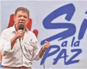  ?? LUIS ROBAYO, AFP, GETTY IMAGES ?? Colombian President Juan Manuel Santos speaks to an audience during the first day of the campaign “Pedagogy for Peace” to inform people about the peace talks between the government and the FARC guerrillas in Cali, Colombia.