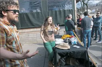  ?? Stephanie Strasburg/Post-Gazette ?? Christine Iksic and Scott Ferrari, left, both of Aspinwall, collect used outdoors gear at Grist House Craft Brewery in Millvale in preparatio­n for this month’s Gear Fest, co-founded by Ms. Iksic. The event will feature a consignmen­t sale of outdoor...