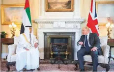  ?? WAM ?? Shaikh Mohammad Bin Zayed meets with Boris Johnson during a reception at 10 Downing Street in London.