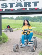  ??  ?? Gayle has a turn on the go-karts.