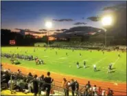  ?? EVAN BRANDT — DIGITAL FIRST MEDIA ?? As the sun set behind Pottstown Middle School Friday night, the panorama of football under the lights unfolded.