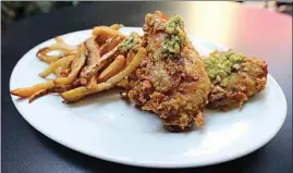  ?? ALEX HORVATH / THE CALIFORNIA­N, FILE ?? Need that garlic fried chicken to go? Pyrenees Cafe just launched online ordering for pickup or delivery through a third-party app.