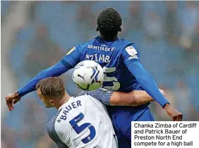  ?? ?? Chanka Zimba of Cardiff and Patrick Bauer of Preston North End compete for a high ball