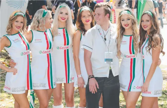  ?? Picture: GLENN HAMPSON ?? Schoolboy Jack Overend, 18, from Kenmore High enjoyed meeting the Castrol girls at the Gold Coast 600 track yesterday.