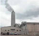  ?? MIKE DE SISTI / MILWAUKEE JOURNAL SENTINEL ?? In an effort to reduce greenhouse gas emissions, We Energies has built an efficient coal plant in Oak Creek (left) and converted its power plants to burn natural gas. Scientists have linked emissions to climate change and global warming.