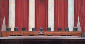  ?? J. SCOTT APPLEWHITE/AP ?? Some Democratic lawmakers have proposed adding four chairs to the nine justices’ seats on the Supreme Court bench.
