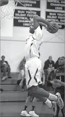  ?? TIM COOK/THE DAY ?? Eric Paschall goes up for a slam dunk during a 2014 game for St. Thomas More in Montville. The 6-foot-9 forward now stars for Villanova, where he has been joined by another former T-More player, Omari Spellman, as the two attempted to lead the Wildcats...