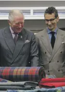 ??  ?? Charles, Prince of Wales and Federico Marchetti of YNAP with participan­ts in the pair’s new Modern Artisan Project