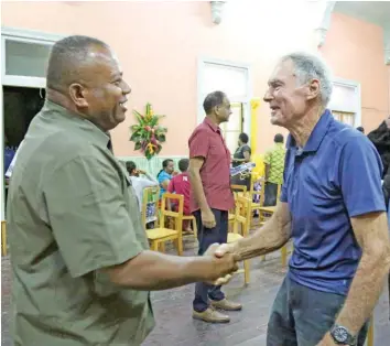  ?? Photo: Kelera Sovasiga ?? Minister for Rural and Maritime Developmen­t and Disaster Management Inia Seruiratu with Ovalau identity Ernest Douglas at the Levuka Town Hall on July 14, 2020.