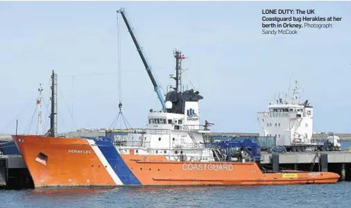  ?? Photograph: Sandy McCook ?? LONE DUTY: The UK Coastguard tug Herakles at her berth in Orkney.