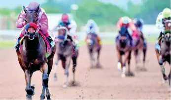  ??  ?? LOOSE BALL (Jerome Innis) wins the ninth race at Caymanas Park on Saturday February 8, 2020.