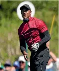  ?? AP ?? Tiger Woods watches his tee shot on the fifth hole during the final round at the Masters in April.