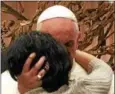  ?? PHOTO PROVIDED ?? Bridgette Nathan receives a hug and blessing from Pope Francis during her recent visit to Vatican City.