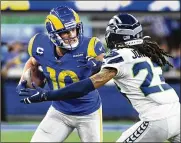  ?? WALLY SKALIJ / LOS ANGELES TIMES ?? Rams wide receiver Cooper Kupp caught two touchdown passes from Matthew Stafford in the second half, and Los Angeles (10-4) held off the Seattle Seahawks 20-10 on Tuesday night in a game between two COVID-depleted teams.