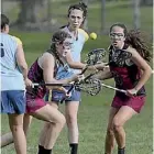  ??  ?? Sacred Heart Girls’ College’s Lucile Richardson controls the ball against Mt Albert Garmmer School.