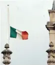 ??  ?? The Tricolour flies at half-mast over Government Buldings